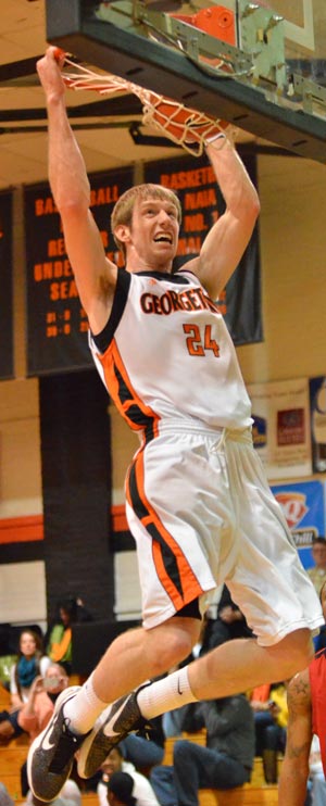 Jordan DeMercy rattles the rim for two of his 20 points against Rio Grande. Photo by Richard Davis