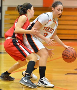 Angie Lawrence came off the bench for 16 points to lead the Tigers. Photo by Richard Davis