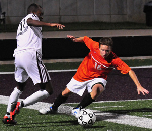 Matthew Murphy plays defense against CU Tigers Thursday. Photo by CU's Richard Robards.